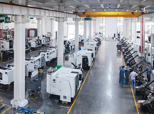 A workshop hall lined with CNC machines