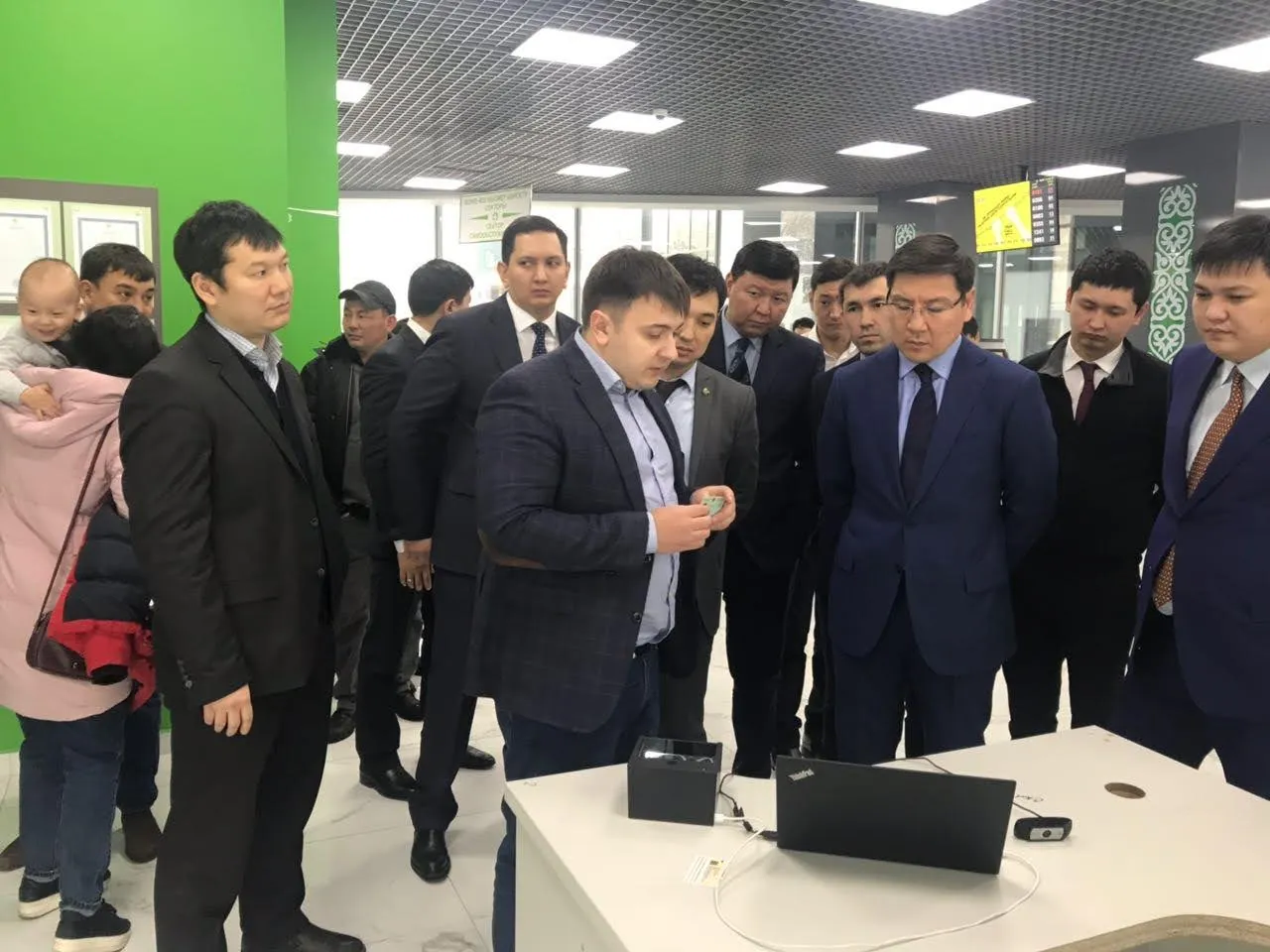 Oleg Sotnikov demonstrating his Face ID and document verification pipelines for public service centers (TsON) to Askar Zhumagaliyev, then Kazakhstan's minister in charge of digitalization