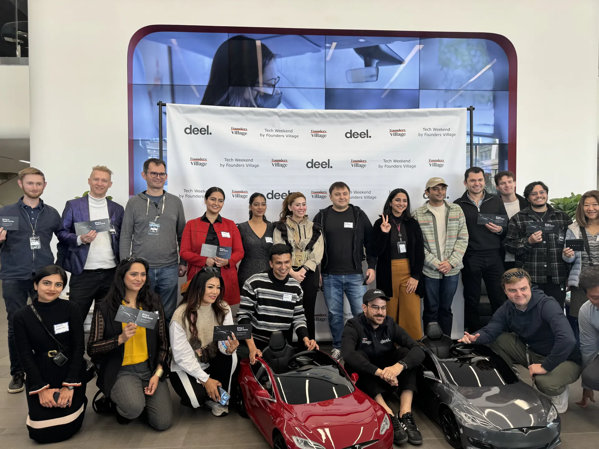 Oleg Sotnikov with Yasmeen Butt at a tech event in the Tesla showroom, San Francisco